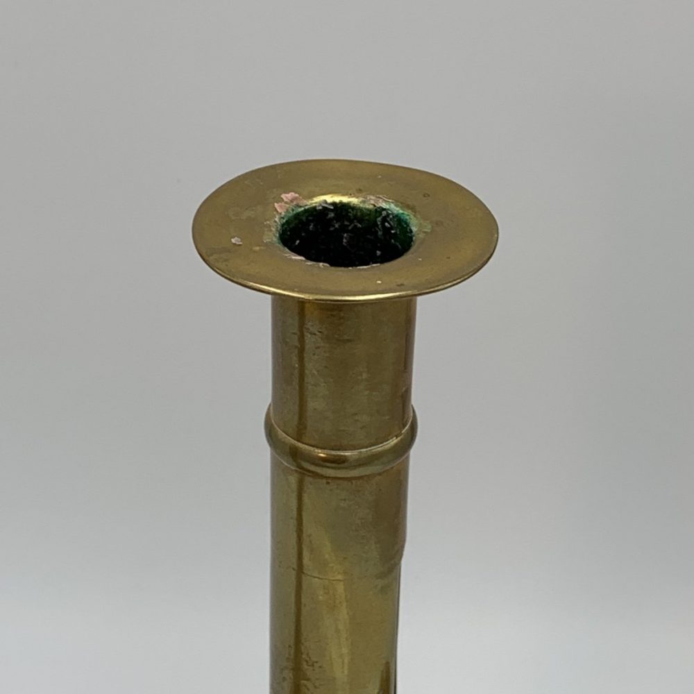 A Pair of English Push-up Brass Candlesticks, with Scalloped Edge